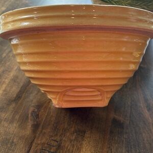 a vintage McCoy yellowware mixing bowl from the mid-1920s